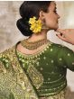 Stuning Green Embroidered Silk Wedding Wear Saree