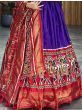 Enchanting Purple Patola Printed Dola Silk Traditional Gown With Dupatta