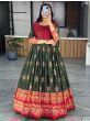 Marvelous Red & Green Bandhani Printed Silk Function Wear Gown