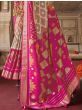 Good-looking Off-White & Pink Patola Printed Silk Wedding Wear Saree