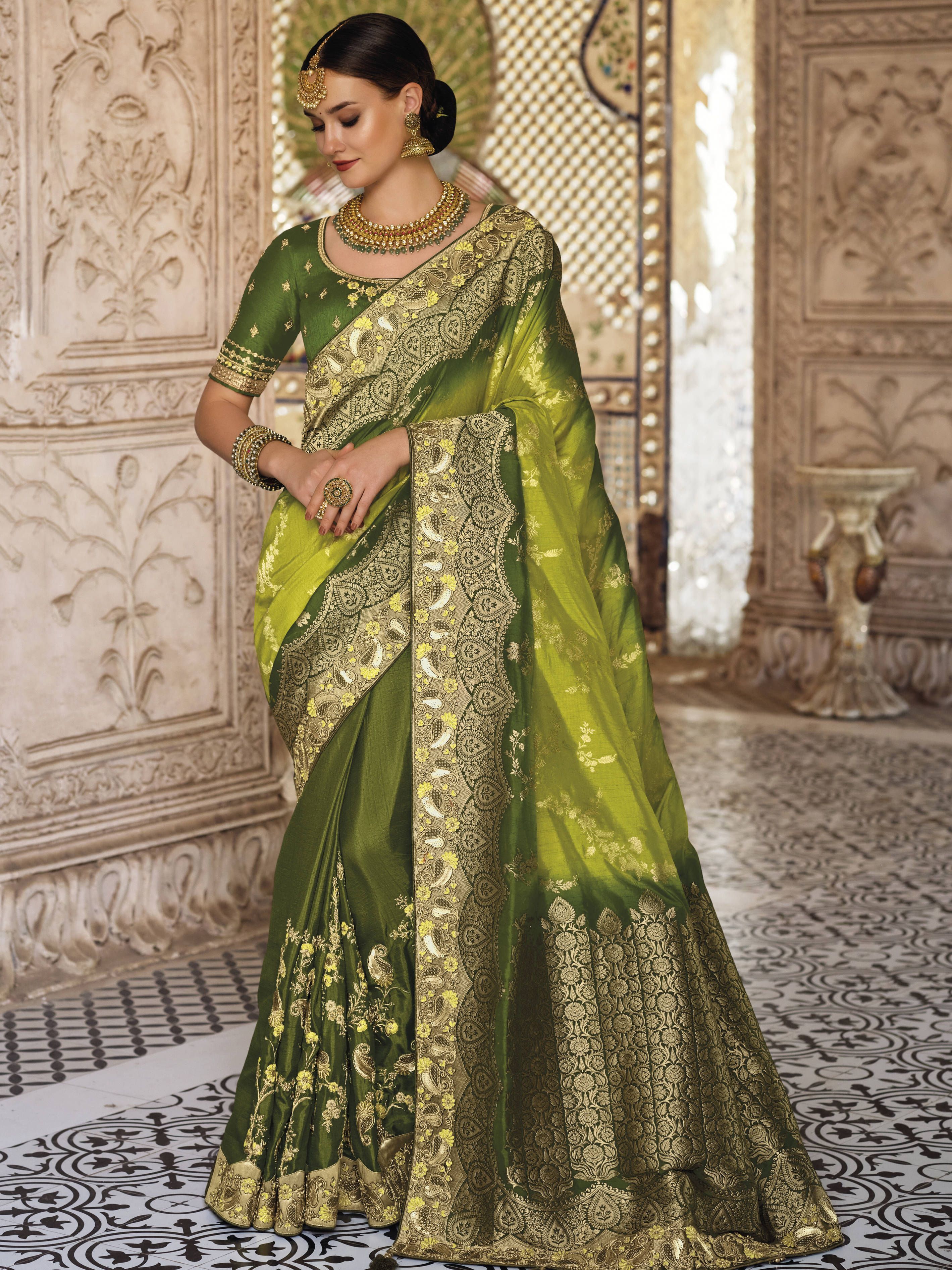 Stuning Green Embroidered Silk Wedding Wear Saree 