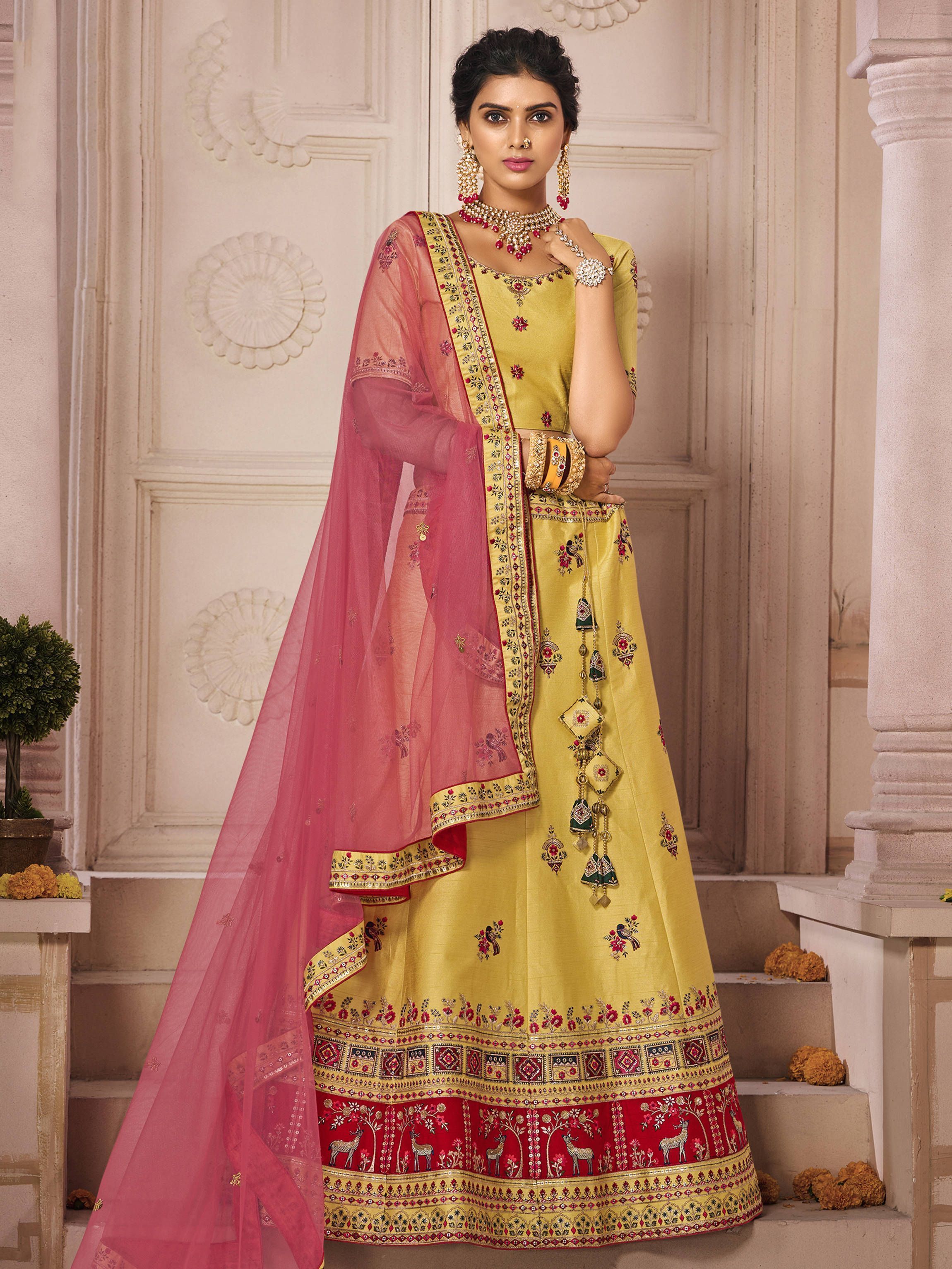 Fantastic Yellow Sequins Embroidered Silk Wedding Wear Lehenga Choli
