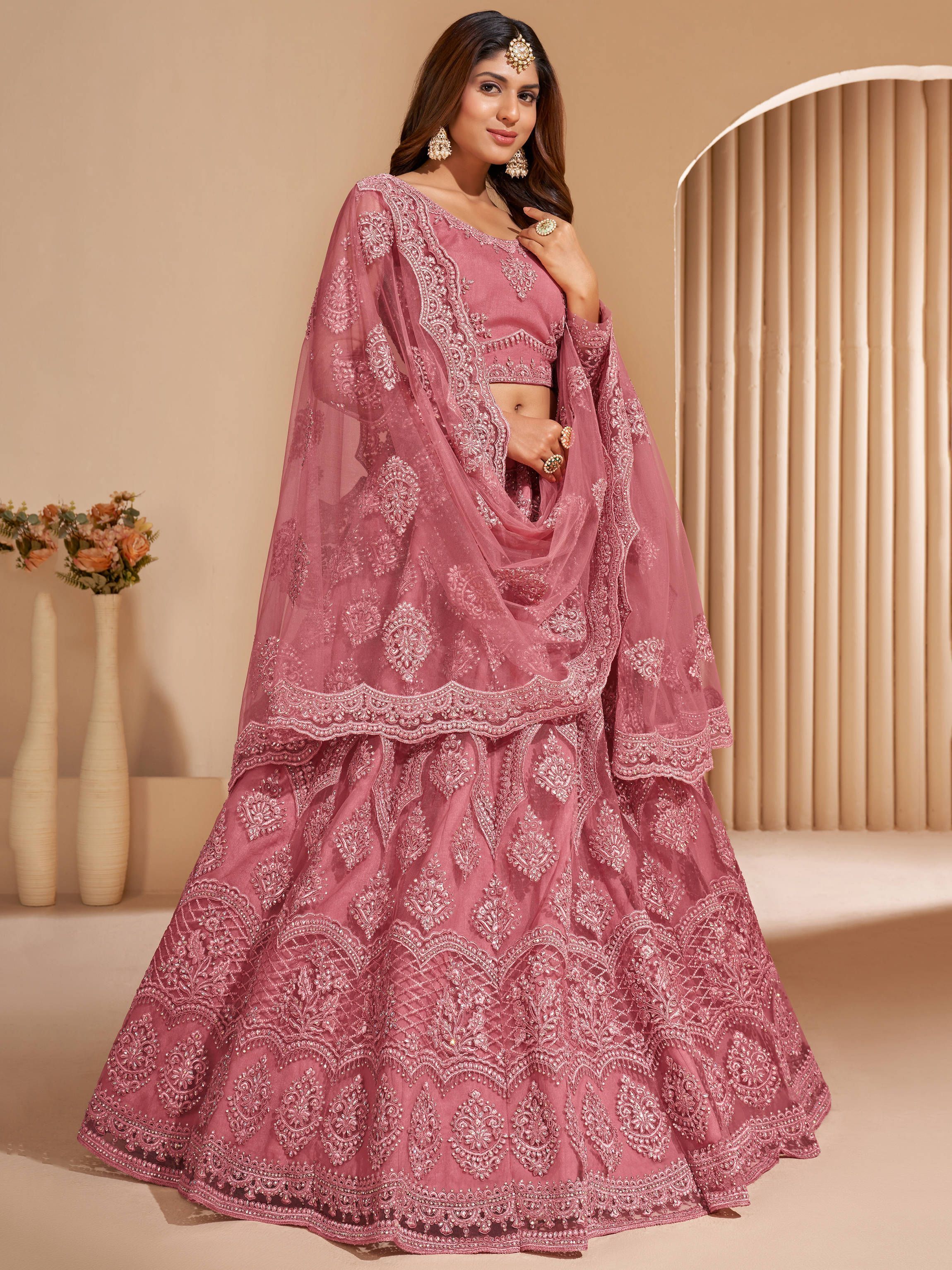 Unique Pink Heavy Embroidered Net Wedding Wear Lehenga Choli