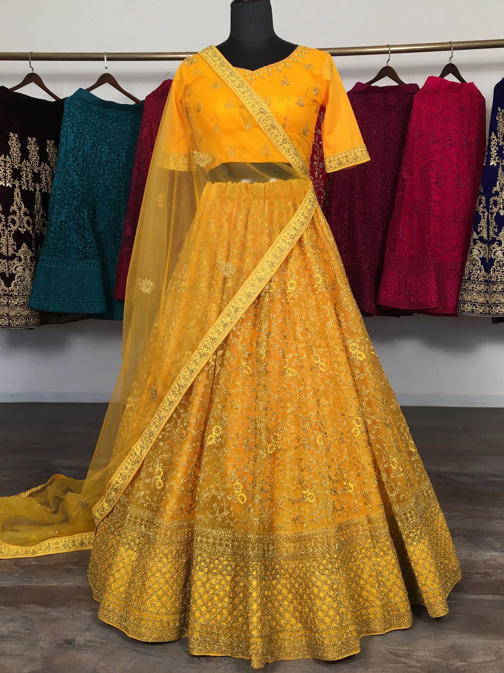 Yellow Zari Embroidered Net Wedding Wear Lehenga Choli