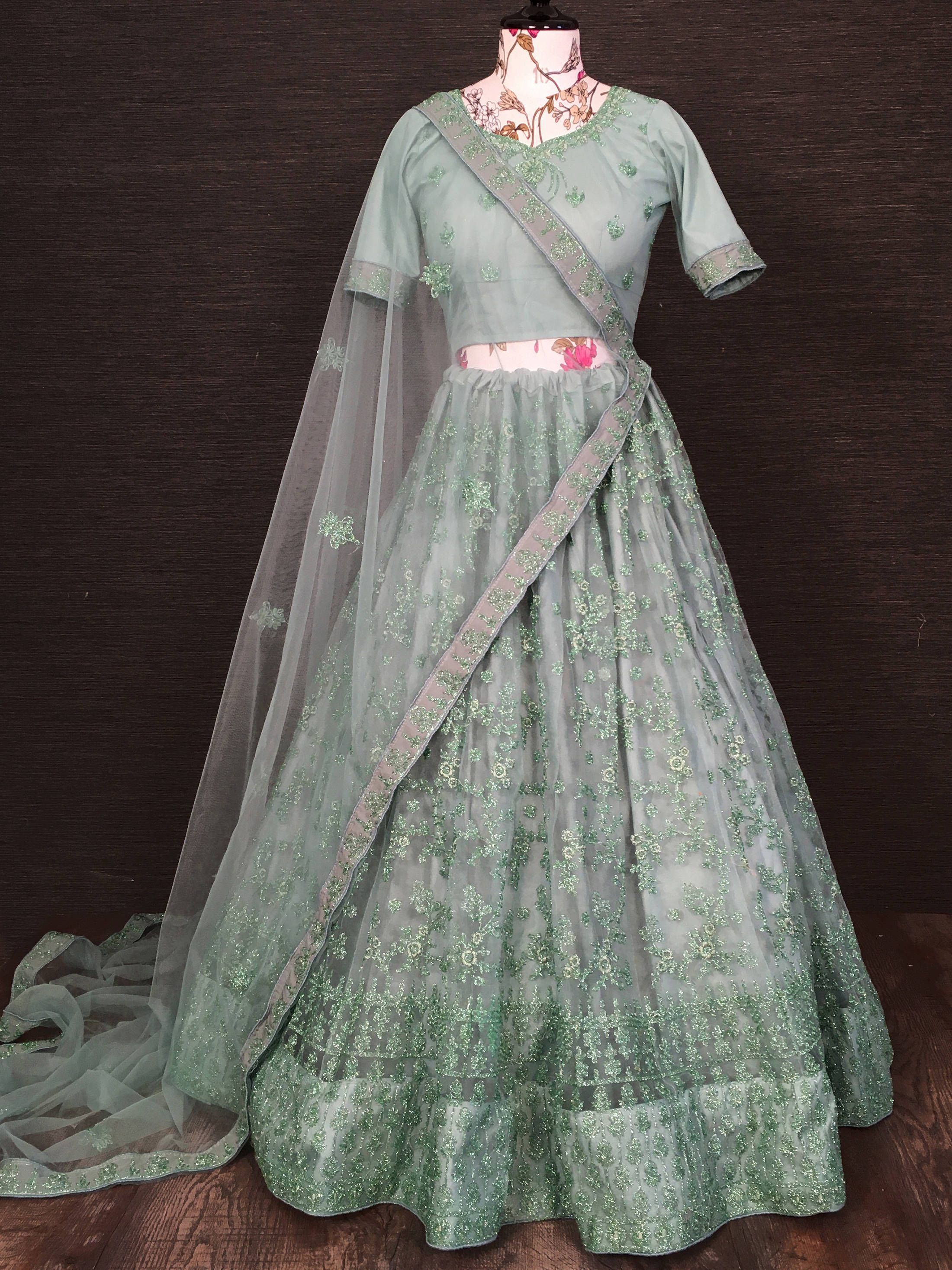 Dusty Green Glittery Zari Embroidered Net Wedding Wear Lehenga Choli