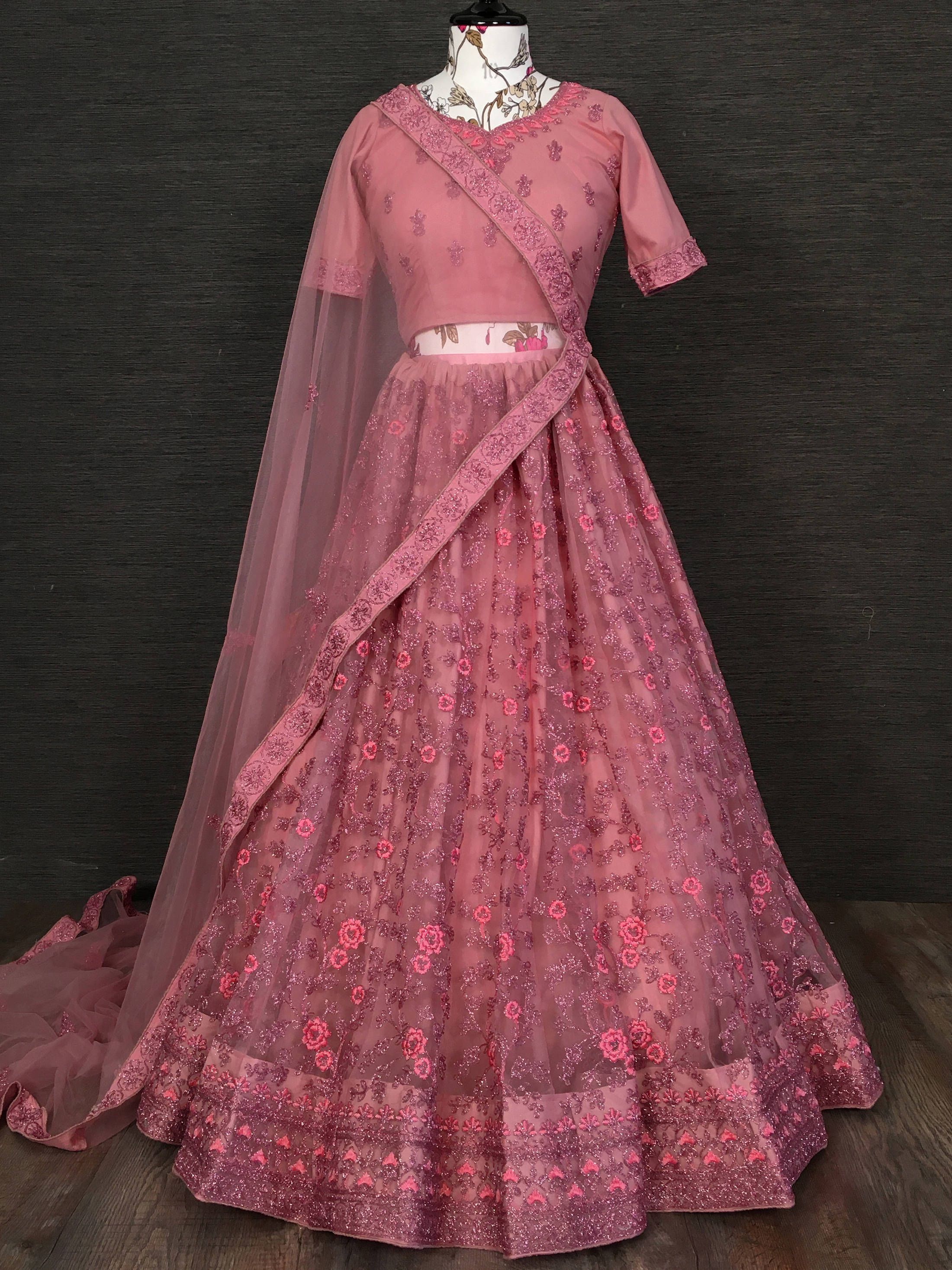 Dusty Pink Glittery Zari Embroidered Net Wedding Wear Lehenga Choli