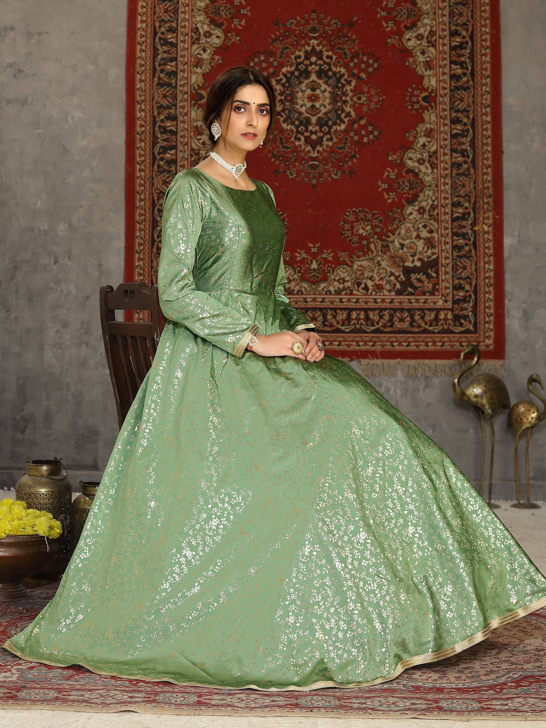 Pista Green Embroidered Netted Anarkali Style Gown