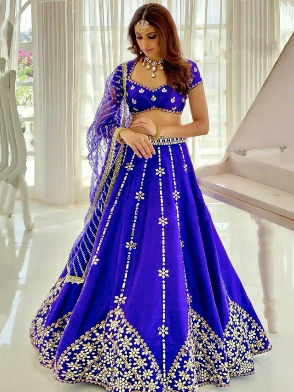 Indian Bride In Blue Lehenga Dress Sitting On A Decorated Seat With Flowers  At A Wedding Stage With Beautiful Simple Decoration Stock Photo - Download  Image Now - iStock