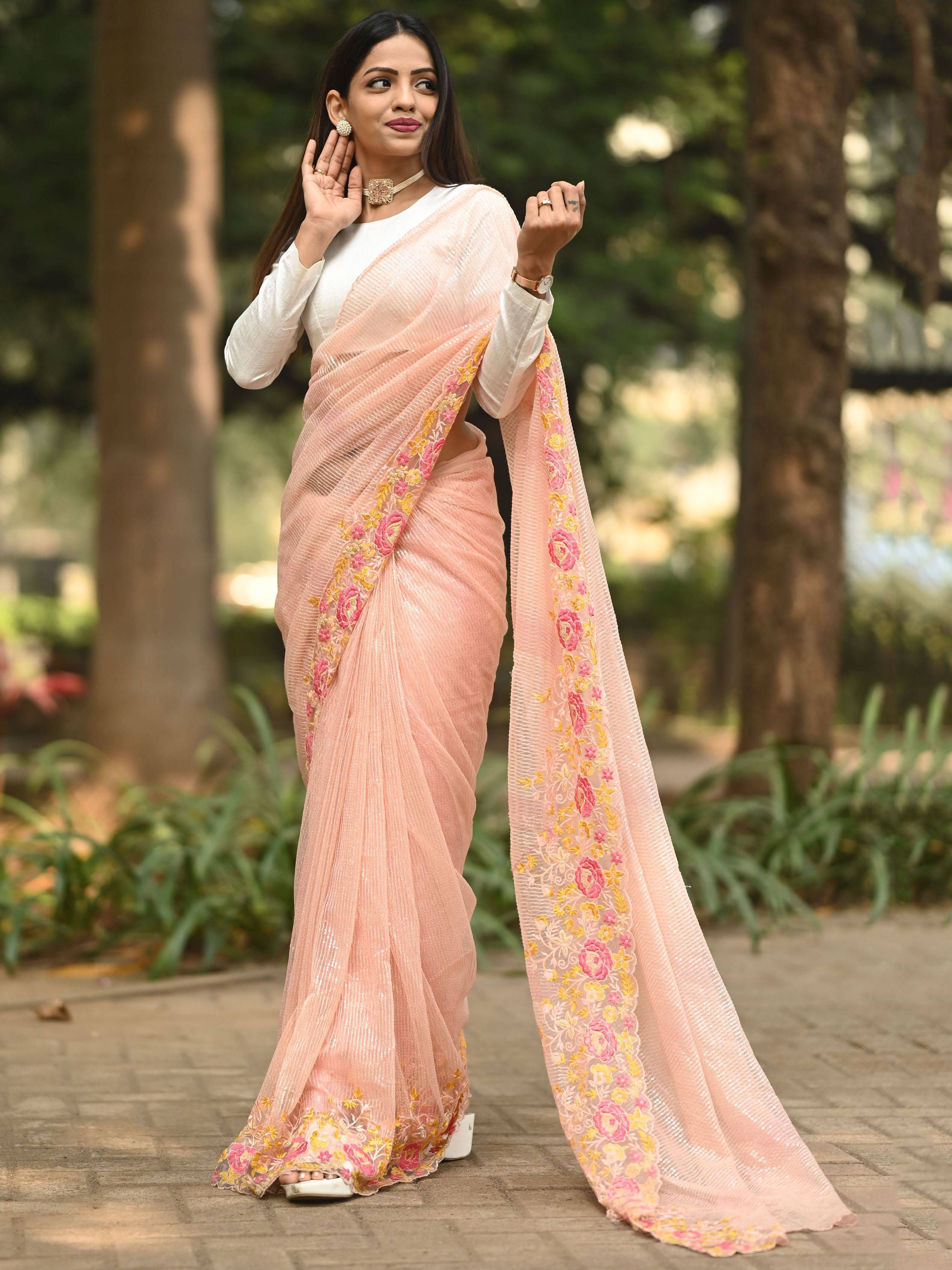 Dazzling Peach Sequins Embroidered Satin Party Wear Saree