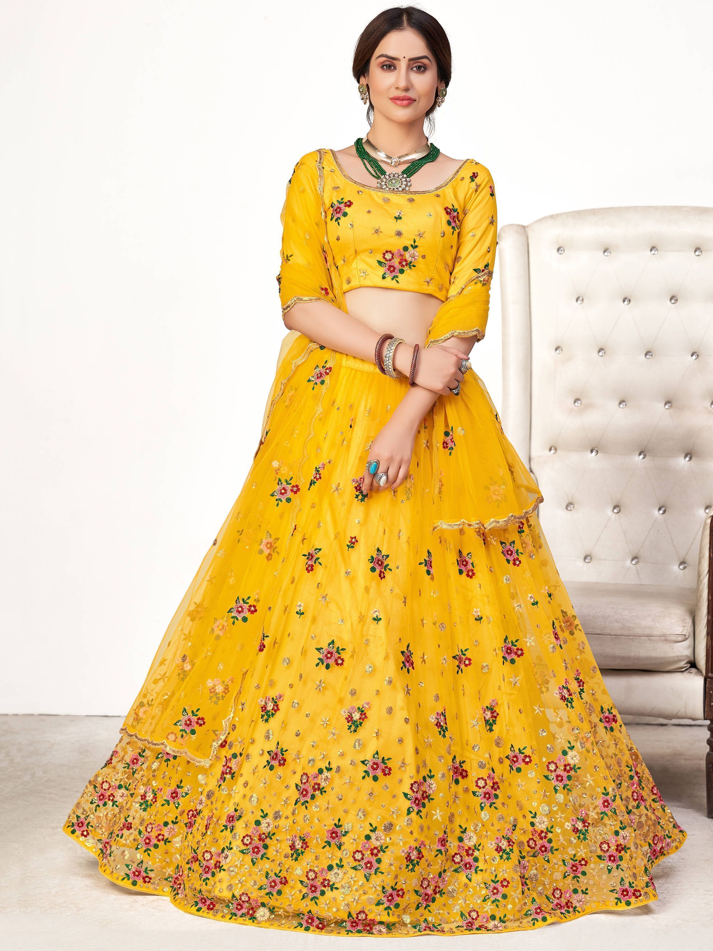 Yellow Floral Embroidered Net Wedding Wear Lehenga Choli