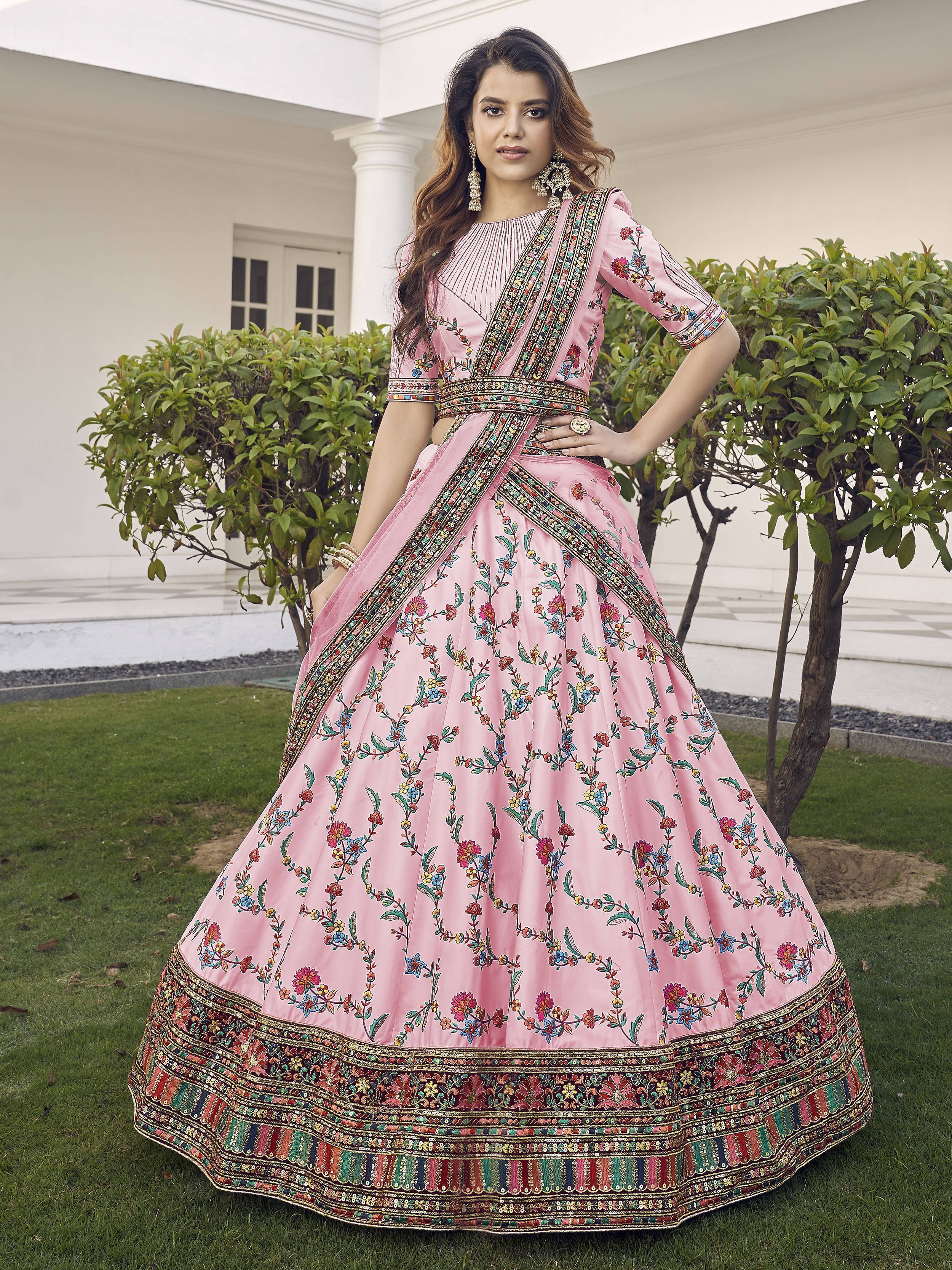 Magnetic Pink Sequins Embroidered Silk Wedding Wear Lehenga Choli