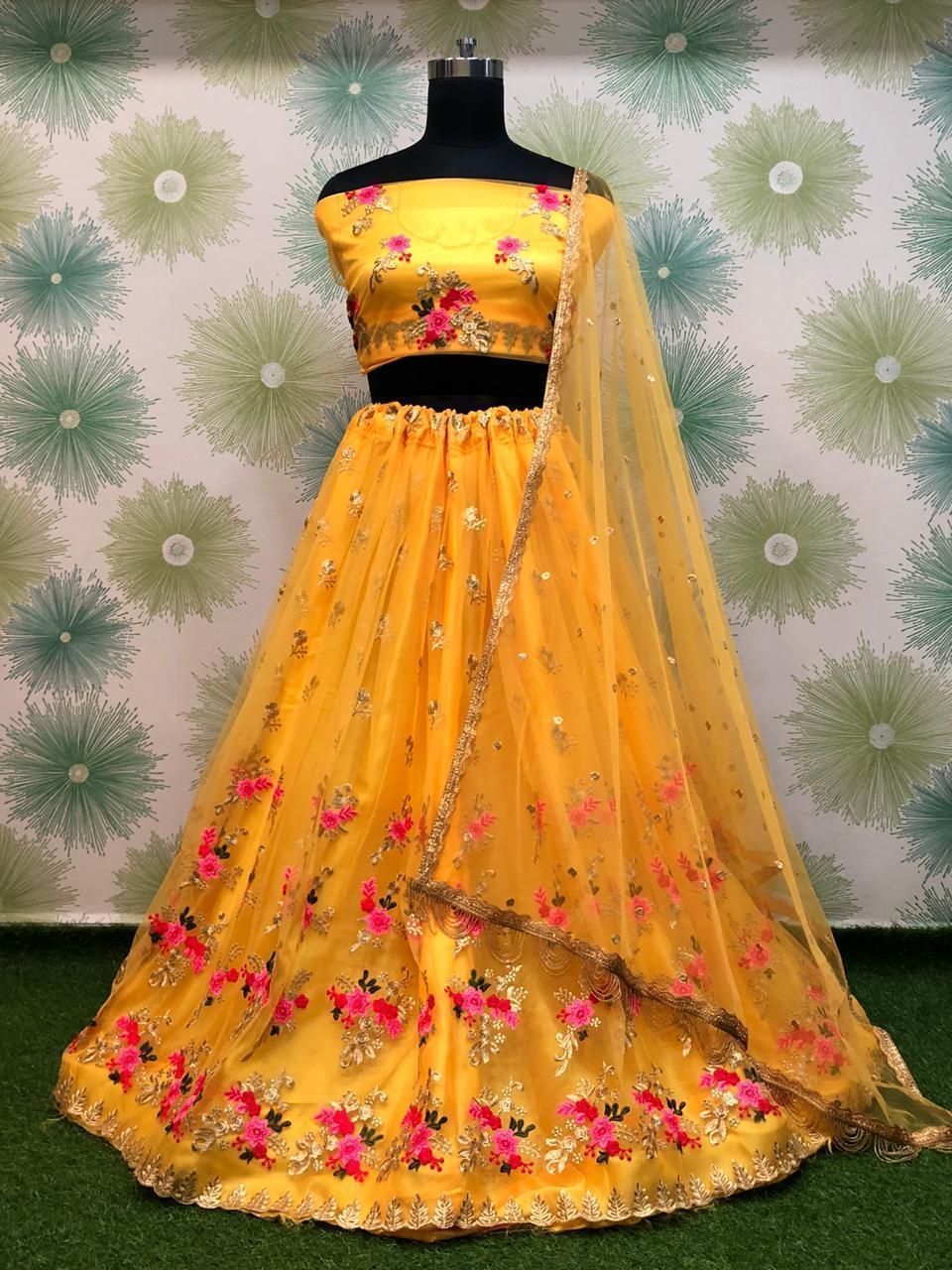 Yellow Embroidered Heavy Net Wedding Lehenga Choli